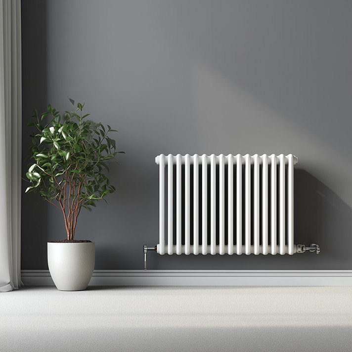 Horizontal anthracite column radiator under a panoramic window in a family lounge